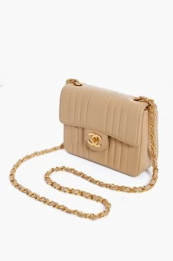 CHANEL Beige Mademoiselle Mini Mastrasse Shoulder Bag -Vogue Vista Clothing JxvtKCpQ3U6j4Yvt2dNrqbfZ0OiFqeKB 1